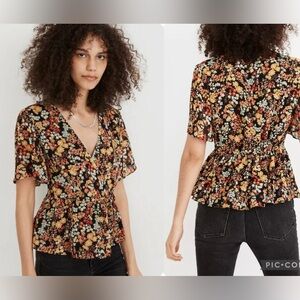 Madewell Women’s Short-Sleeve Peplum Wrap
Top in Flower Garden Size Small.